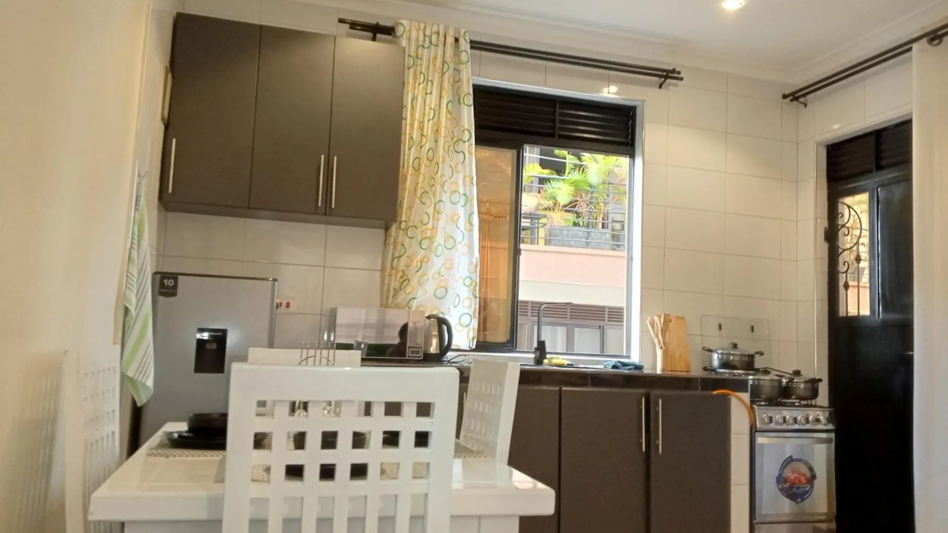 Cozy Retreat Apartments 캄팔라 0*,  우간다